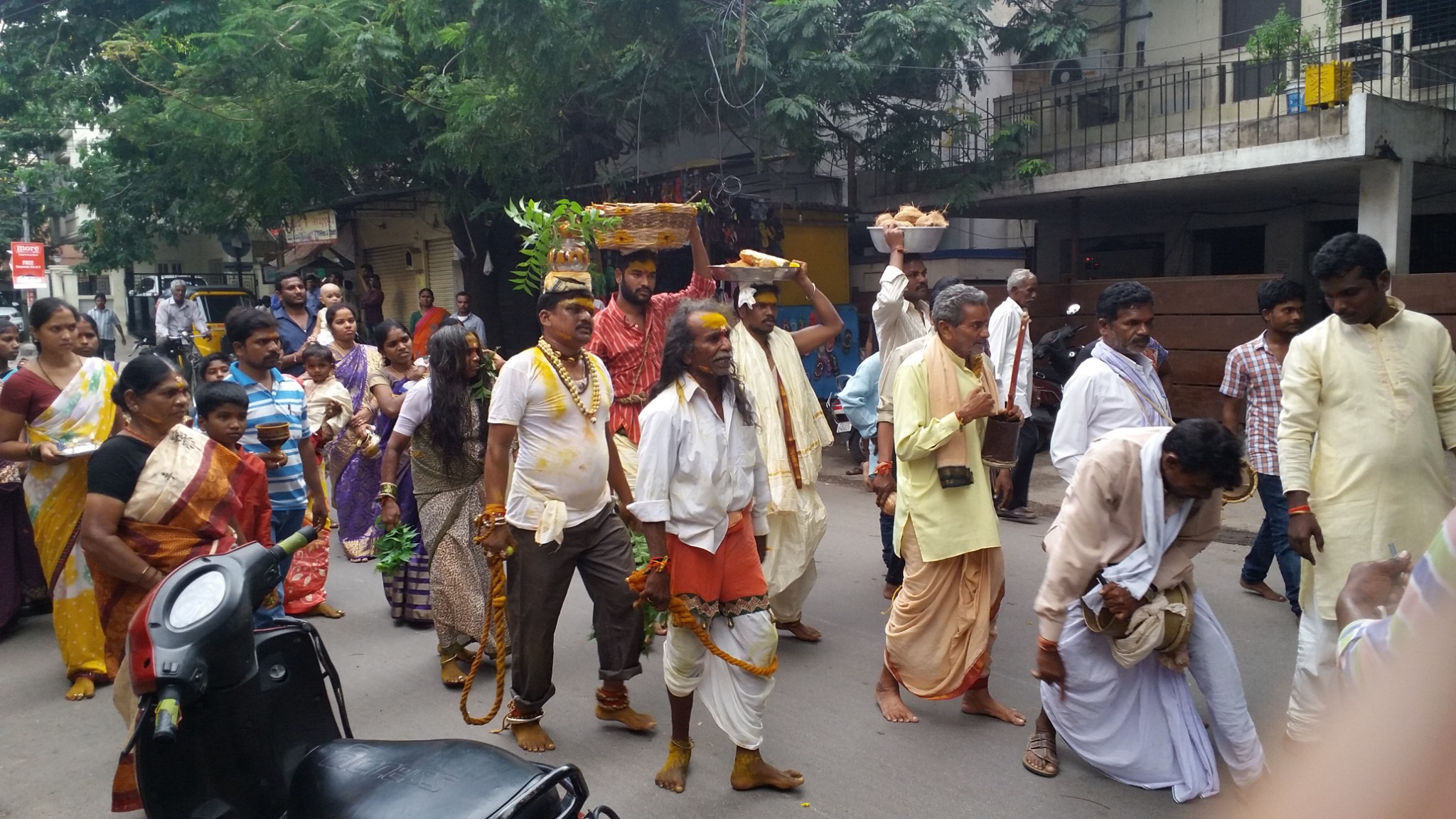 Devotees carrying Bonalu offerings in a community procession